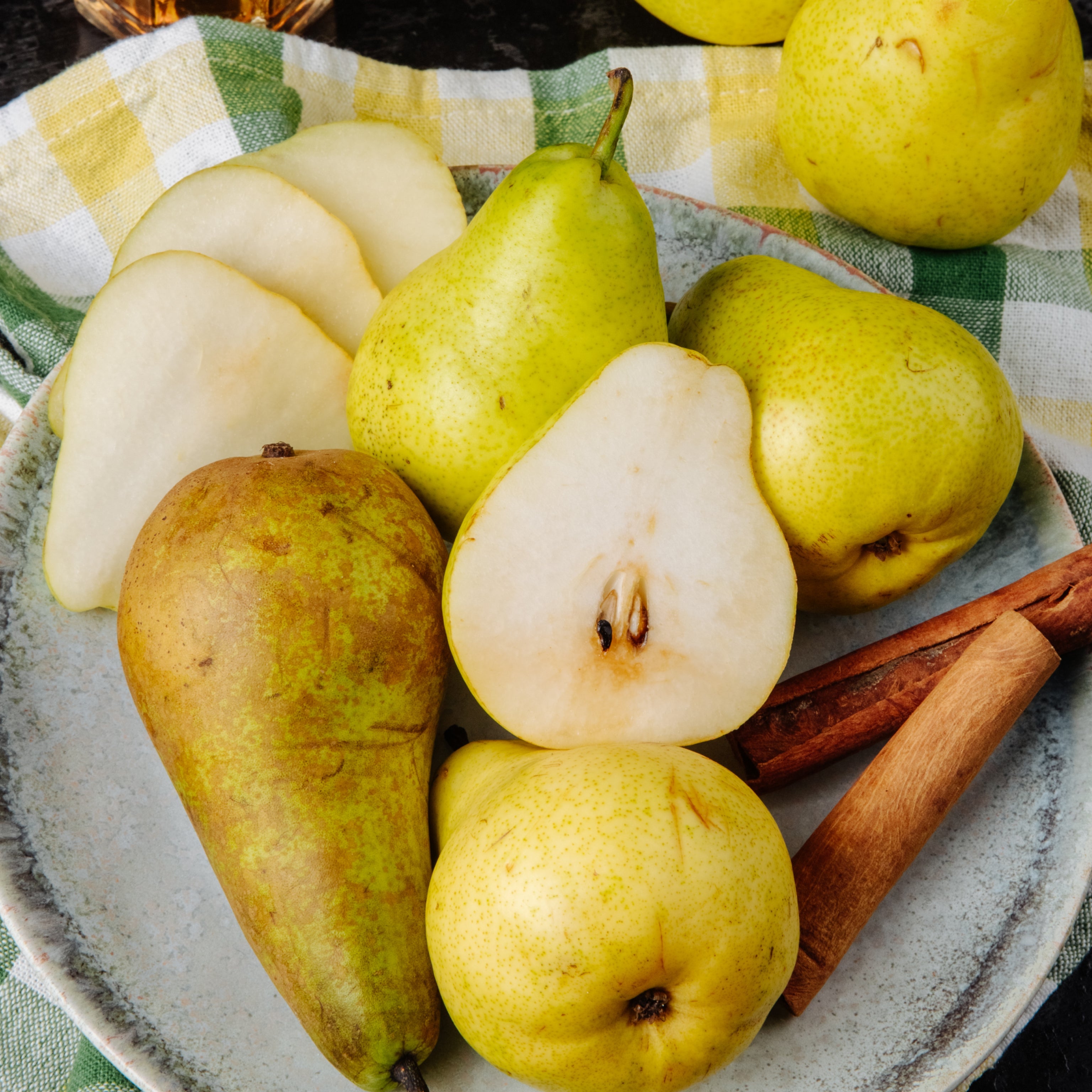 Luxury pear perfumes — Guidance Amouage, Blue Talisman Ex Nihilo, Pear Gelato Theodoros Kalotinis — featuring juicy pear, vanilla, and musk accords. A visual of elegant bottles symbolizing gourmand sweetness and bright fruity freshness.